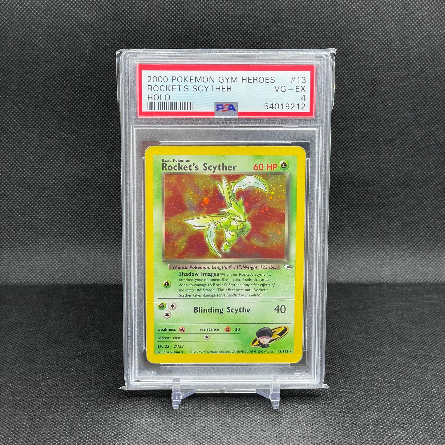 Rocket’s Scyther Holo (PSA 4)